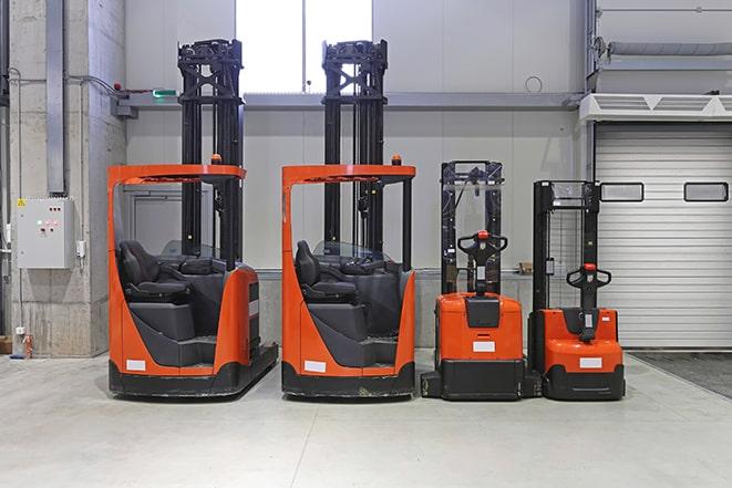 heavy-duty forklifts on a factory floor